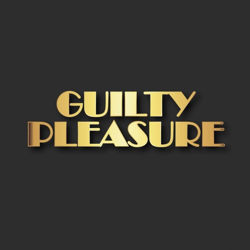 The phrase "GUILTY PLEASURE" is displayed in large, gold, bold letters on a dark background.